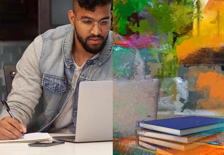 Young adult guy focusing on his studies with a computer he bought from a Tertiary Education loan.