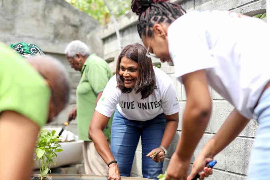 Mrs. Sana Ragbir, GM Retail and Commercial Banking with Yahweh Foundation members as they plant crops