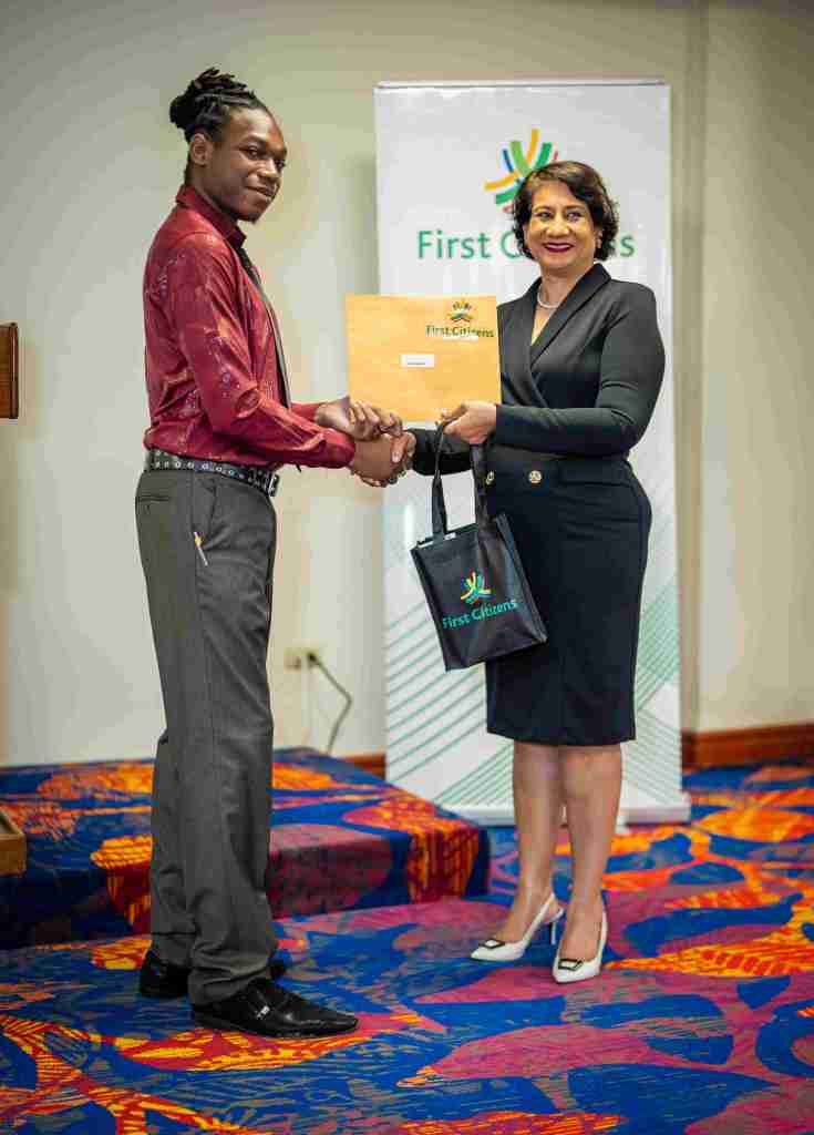 Ms. Karen Darbasie Group CEO presents certificate of participation to Cohort 2 graduate Darlon
Modeste