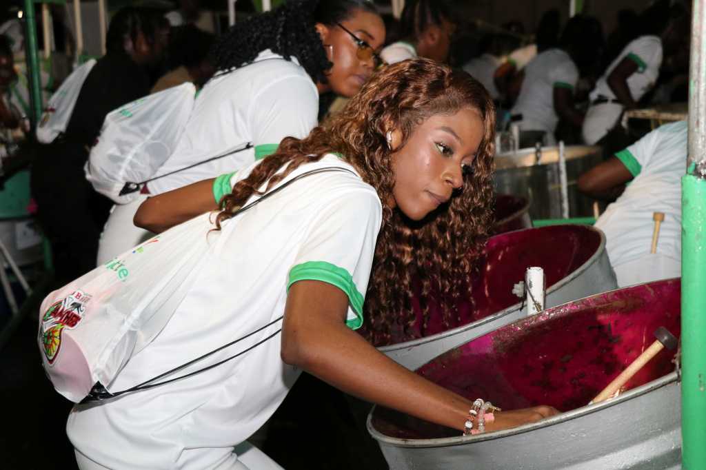 A moment of focus and passion—a First Citizens Tobago Pan-Thers band member in her element.