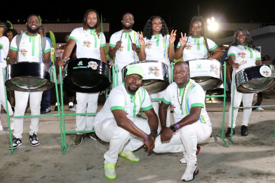 (front right) First Citizens Tobago Pan-Thers Manager, Brian Thomas poses with the team.